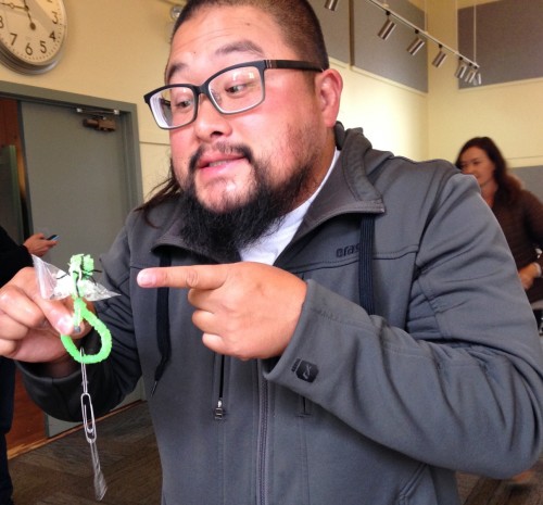 An excited teacher sharing his successful plankton model.