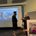 Catie at the EOS Center graduation (May, 2022). 