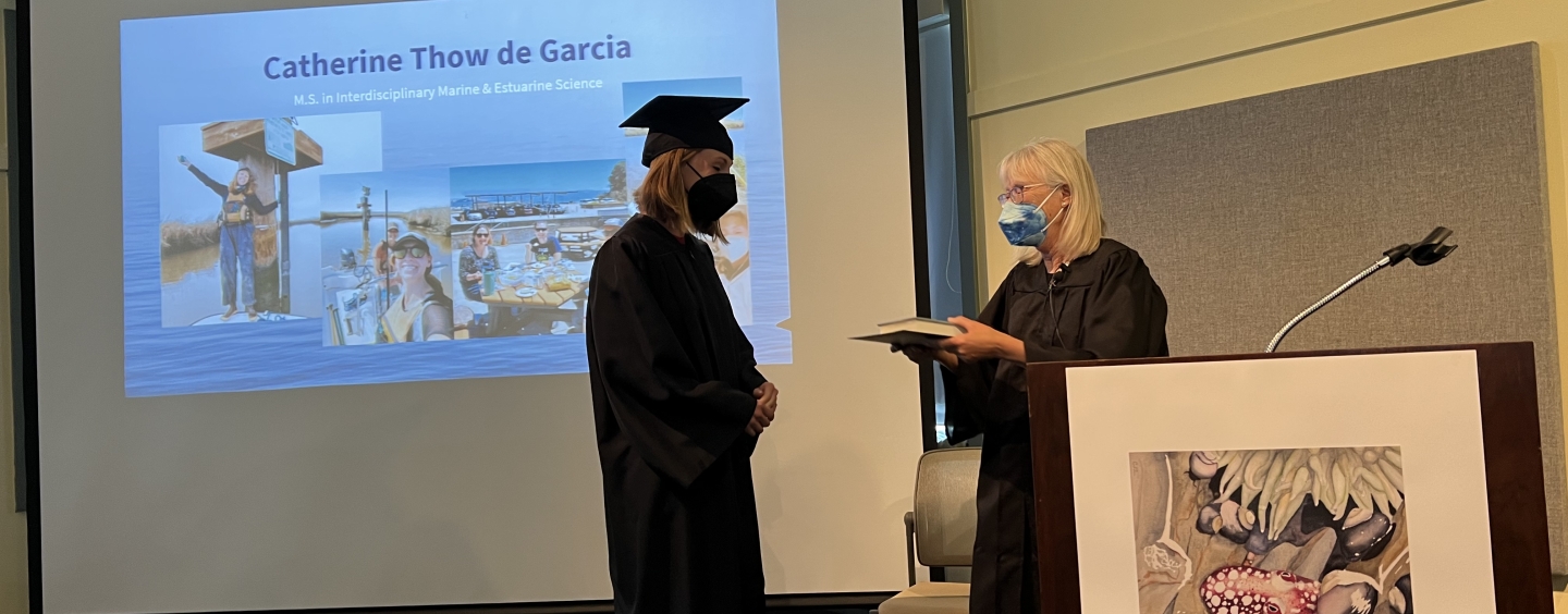 Catie at the EOS Center graduation (May, 2022).